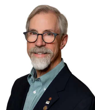 Headshot of Ed Tucker in 2025.