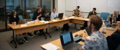 Futures Collaborative members engaged in a discussion.