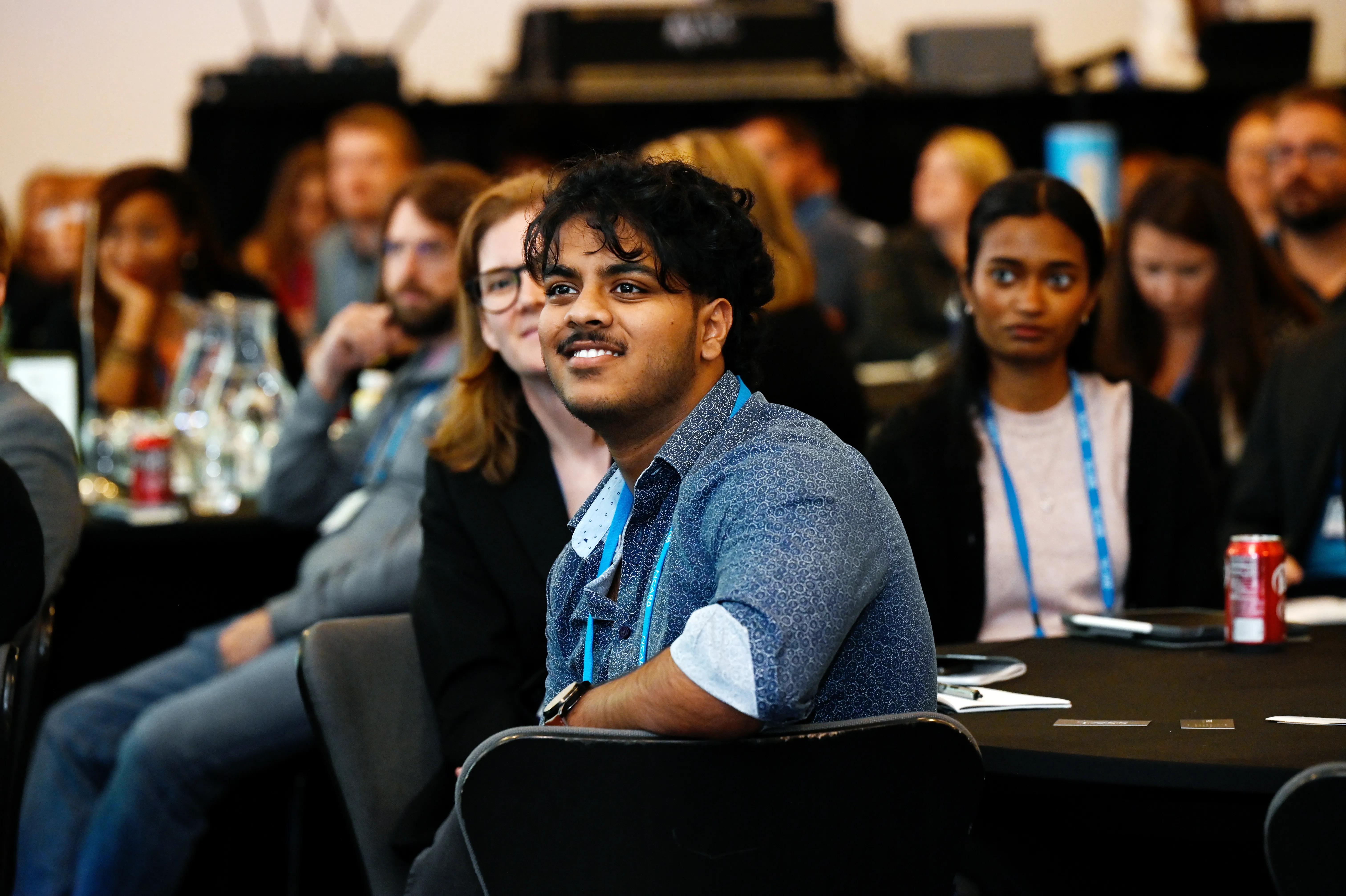Participants listen to a presentation at the 2025 Licensing Advisors Summit.